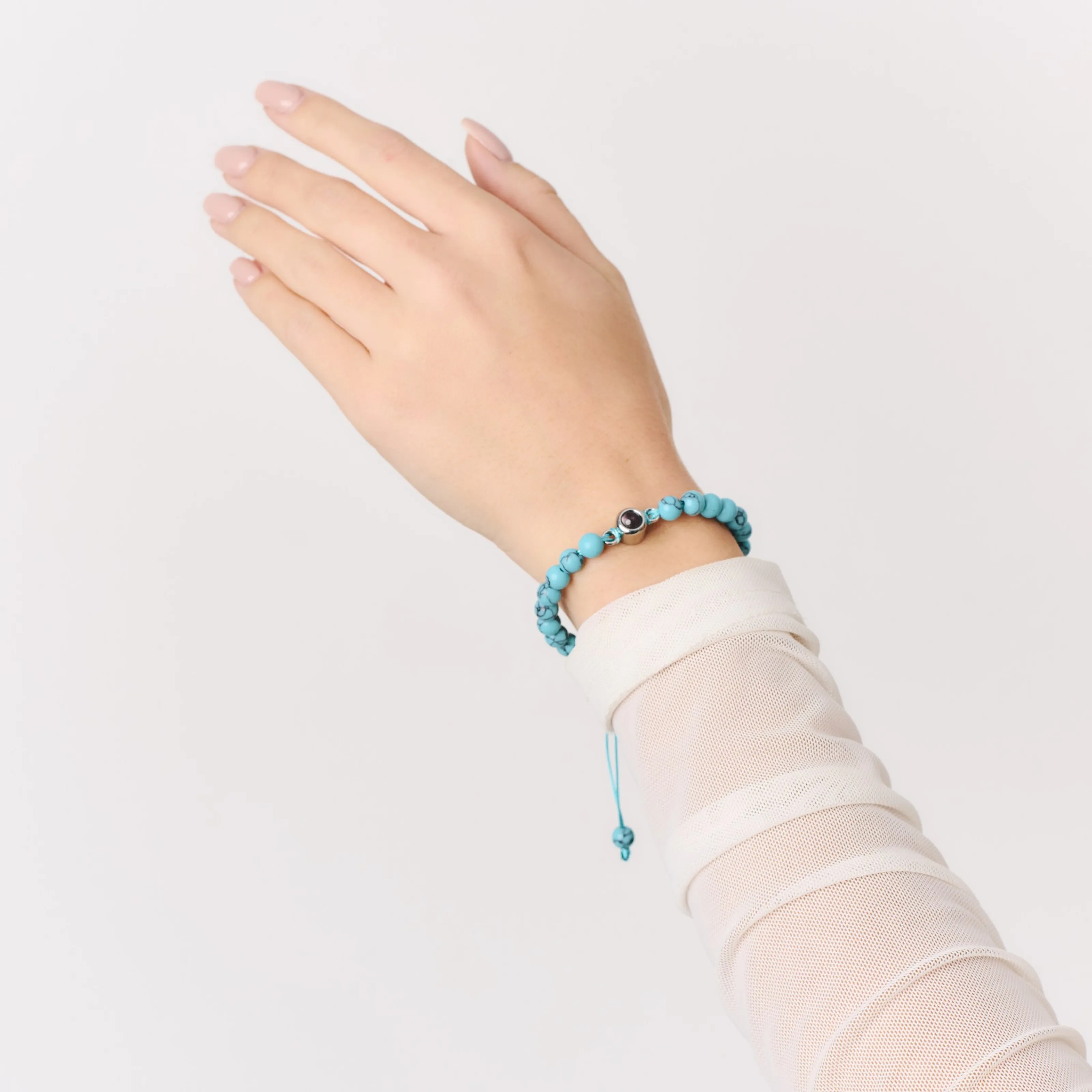 Браслет из бирюзового кахолонга с миниатюрной фотографией внутри